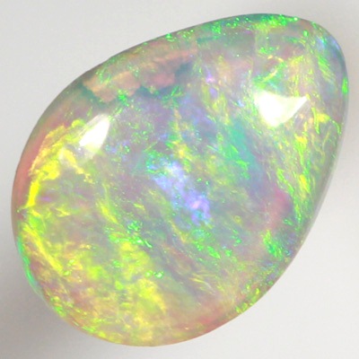 SOLID CRYSTAL OPAL Bright green and orange sparkle over blue green